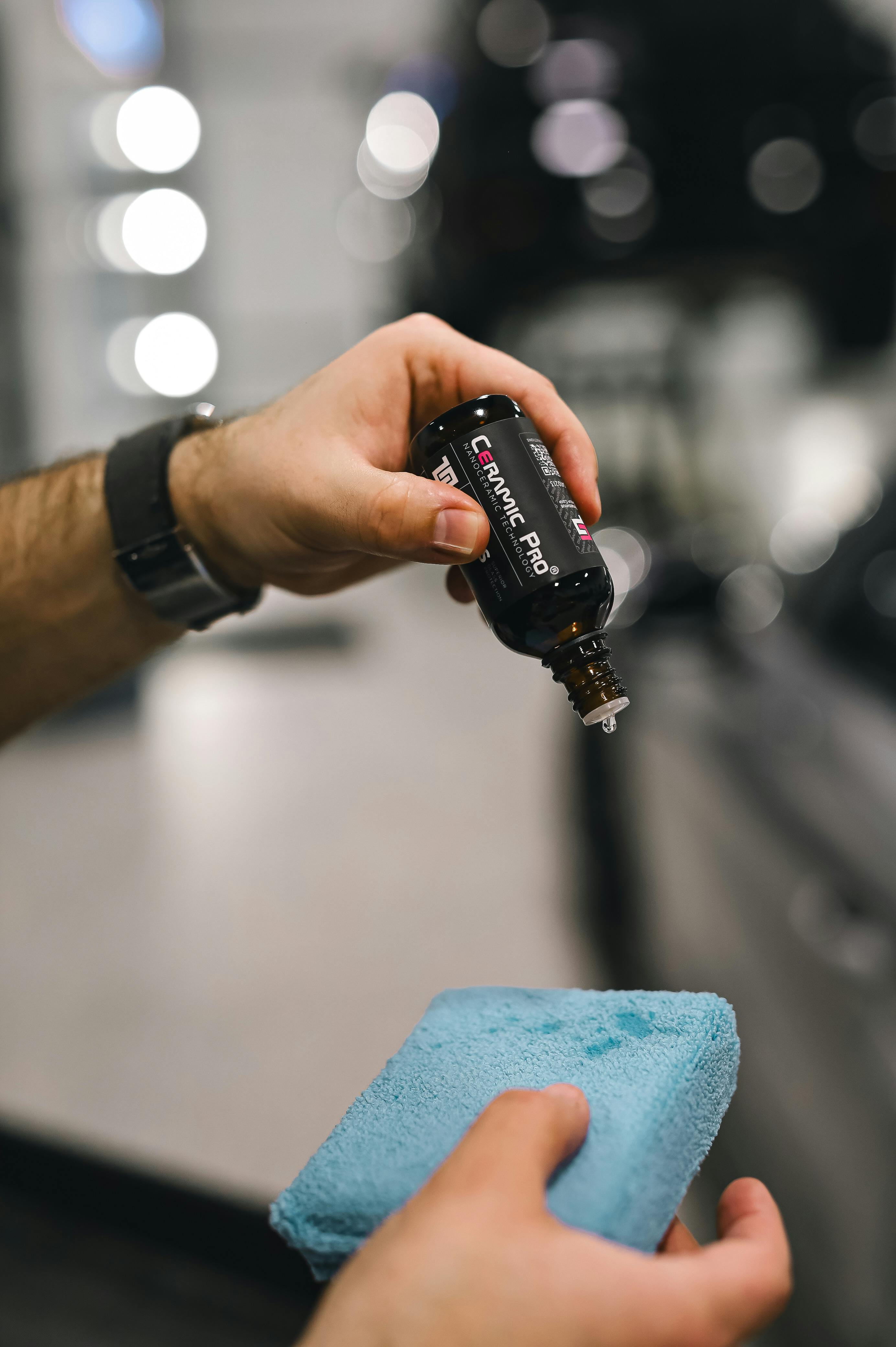 Man putting wax on sponge
